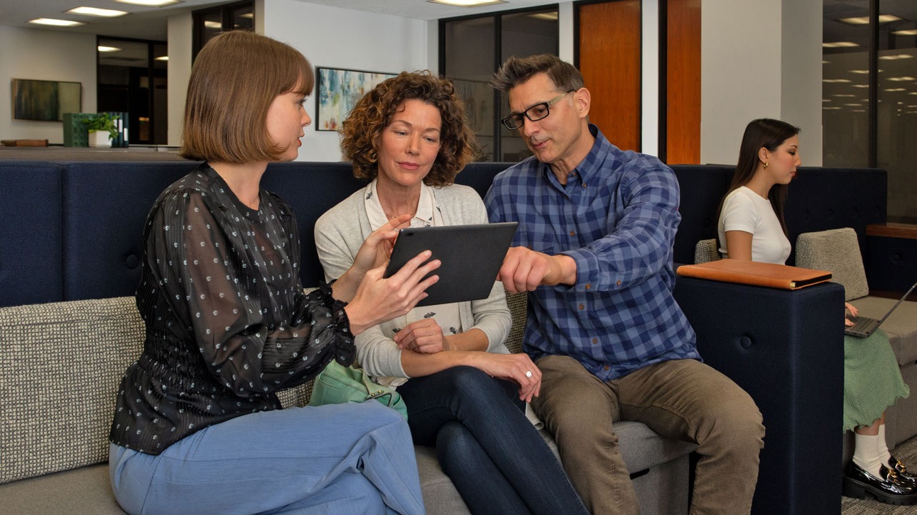 A few people sit around talking about TruStage compliance solutions digital signatures